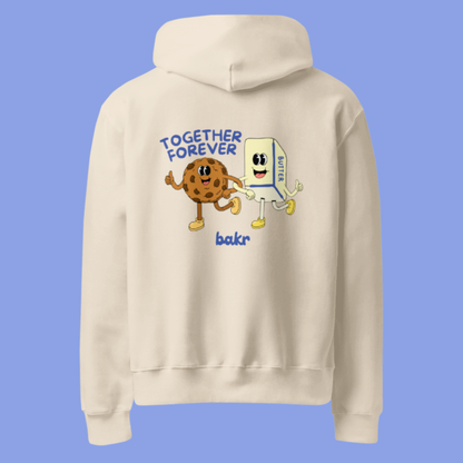 Beige Hoodie with a cookie and stick of butter walking holding hands and the text "together forever" along with the Bakr logo
